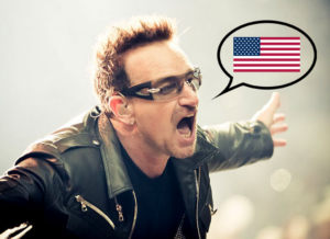 Bono from U2 with an American flag inside a speech bubble