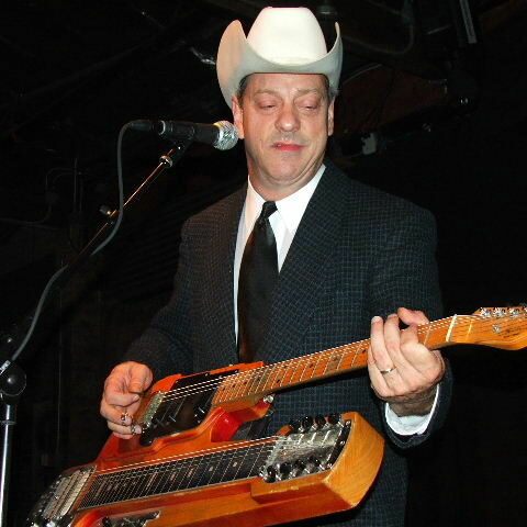 Junior Brown plays his guit-steel